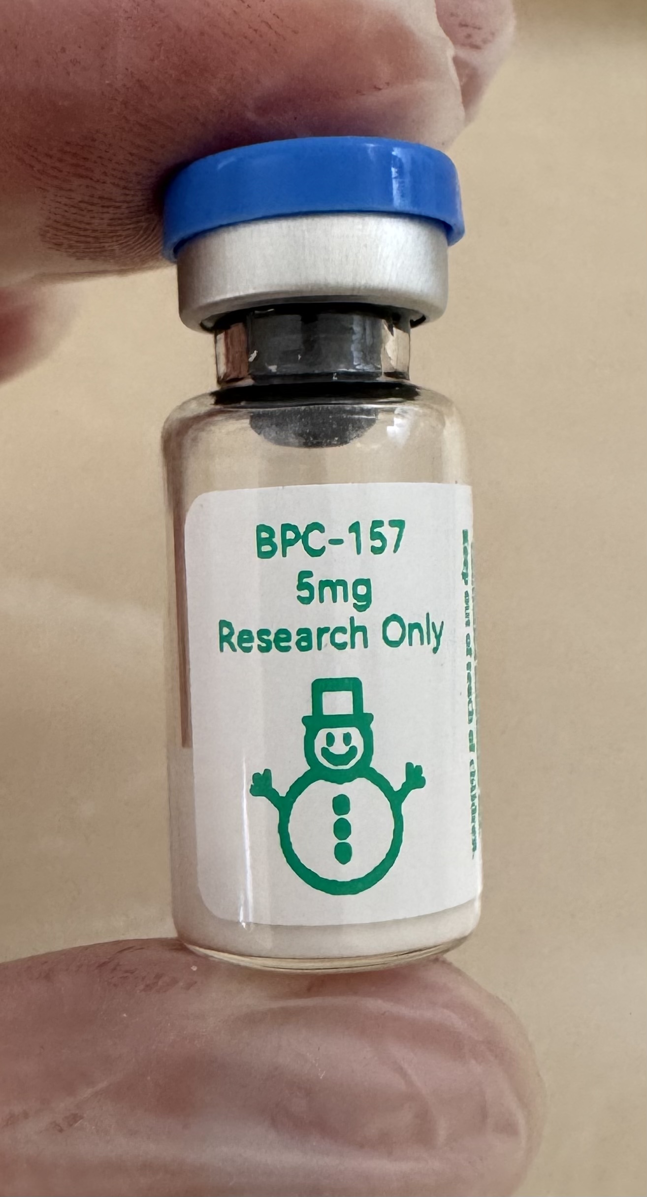BPC-157 pentadecapeptide 5mg freeze-dried research vial with the snowman label