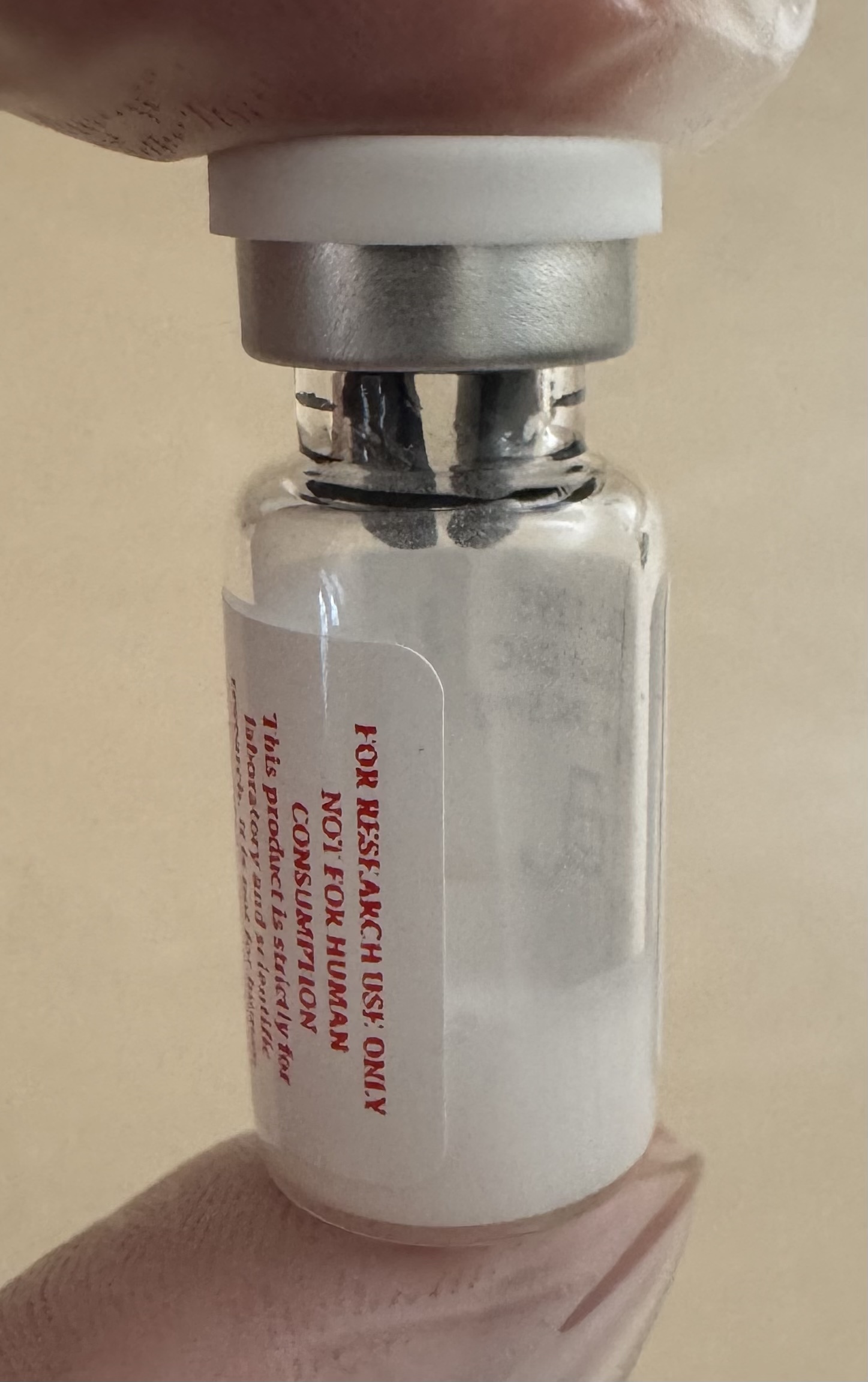 Lyophilized CJC-1295 (no DAC) + Ipamorelin 5mg/5mg powder cake inside the sealed vial