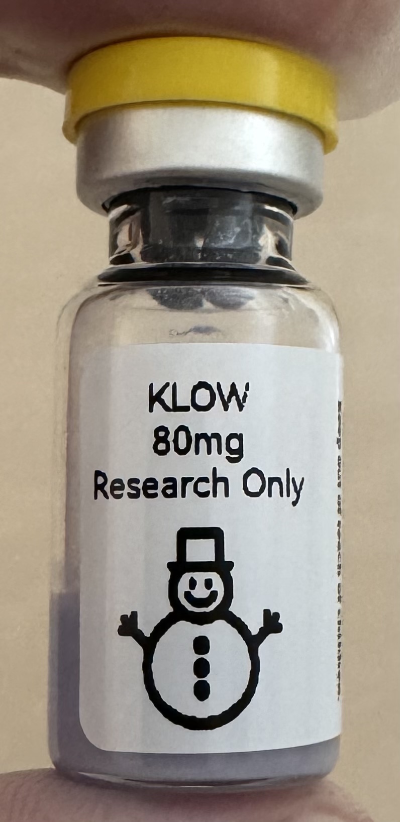 KLOW (GHK-Cu + BPC-157 + KPV + TB-500) 80mg freeze-dried research vial with the snowman label