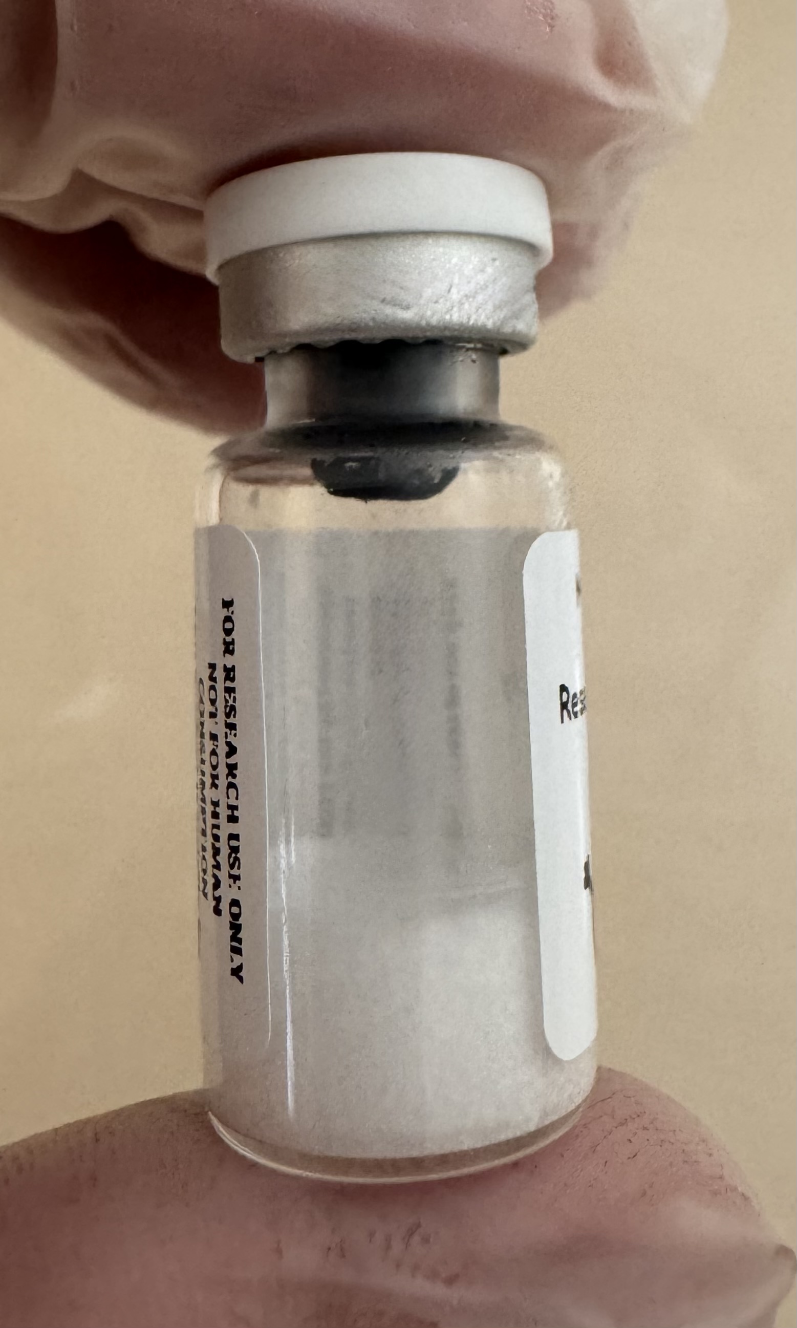 Lyophilized MOTS-c mitochondrial-derived peptide 10mg powder cake inside the sealed vial