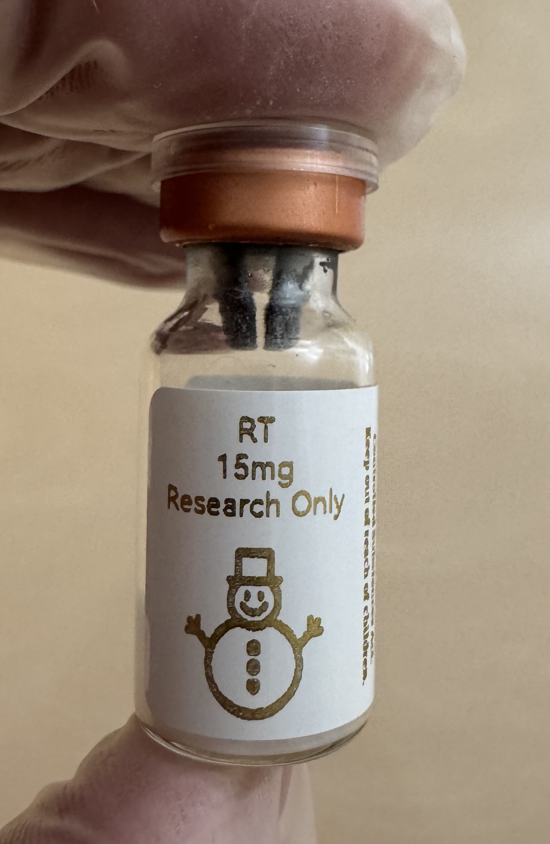Retatrutide (GIP/GLP-1/glucagon) 15mg freeze-dried research vial with the snowman label