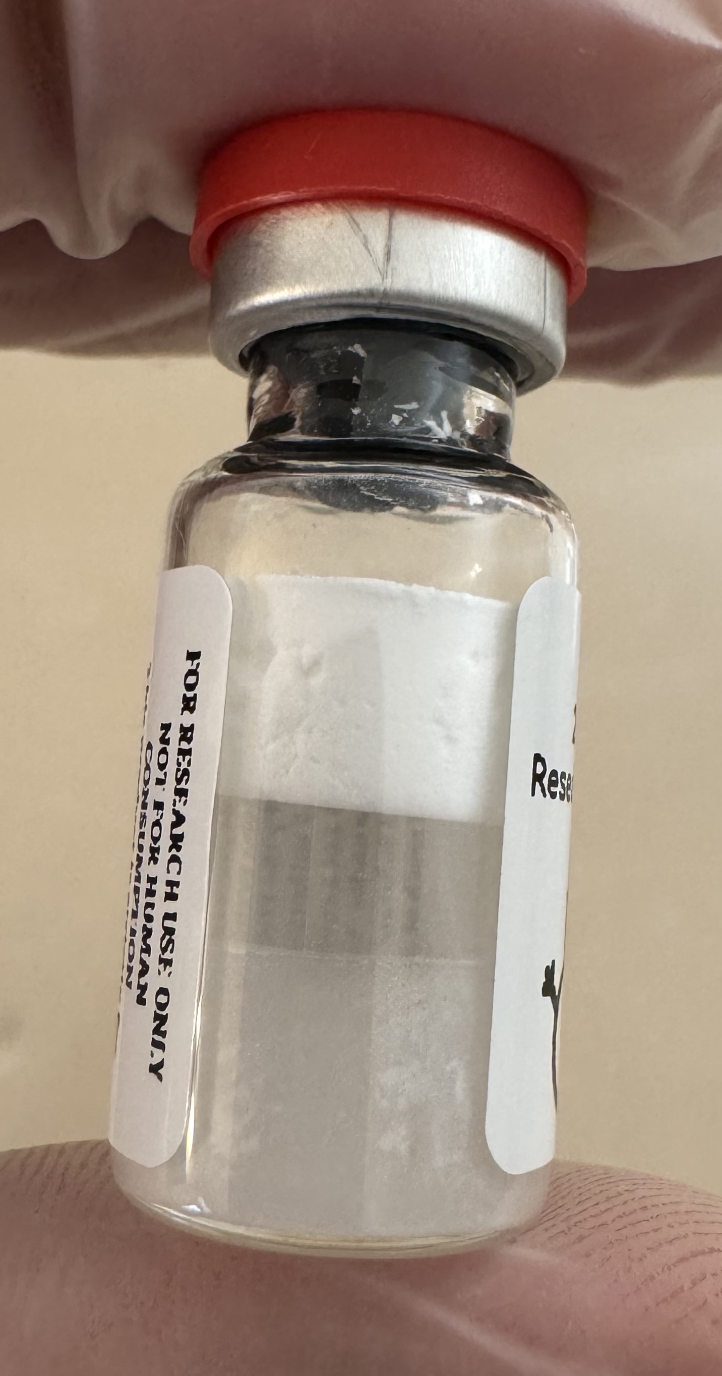 Lyophilized Retatrutide (GIP/GLP-1/glucagon) 20mg powder cake inside the sealed vial