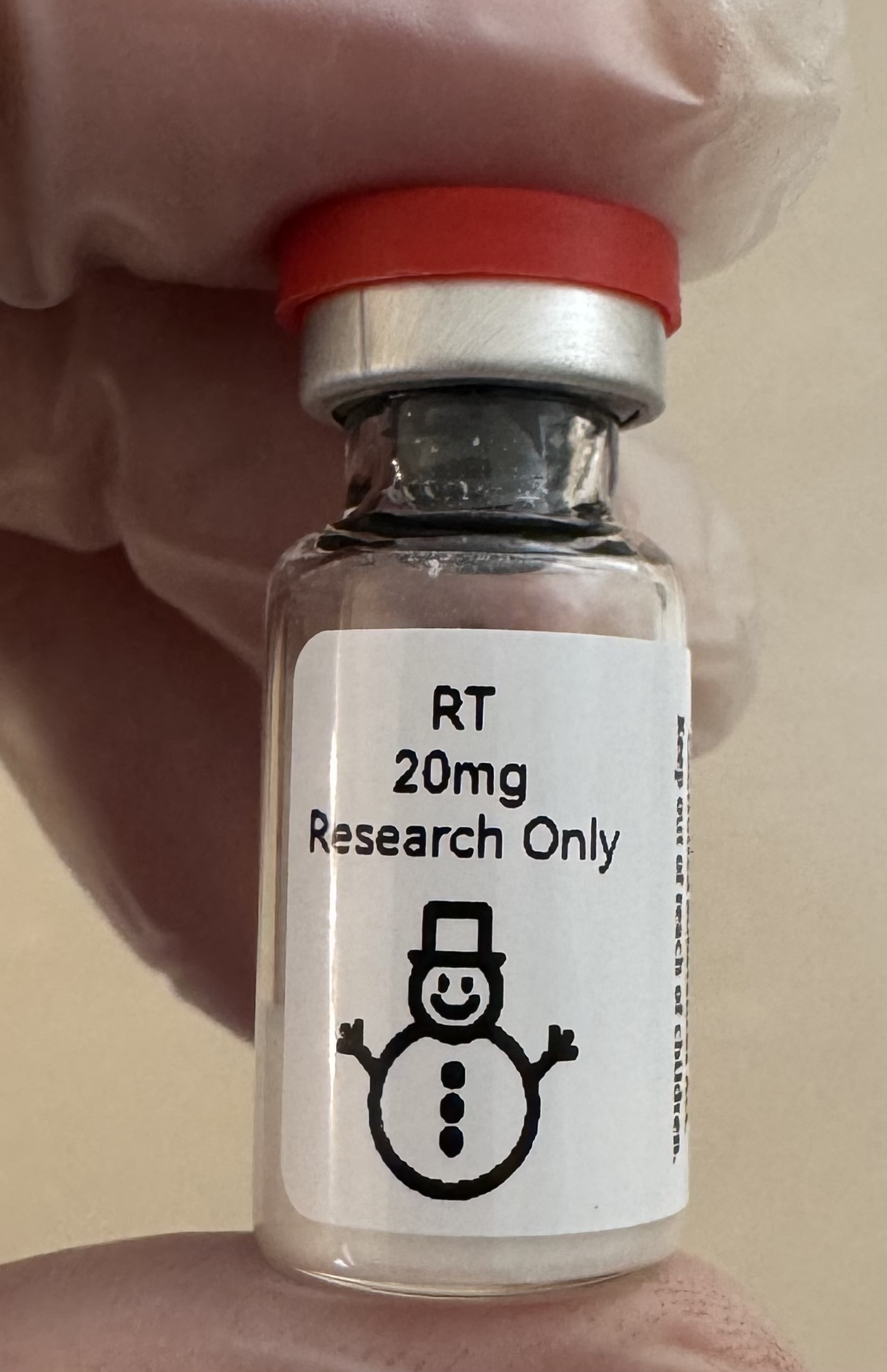 Retatrutide (GIP/GLP-1/glucagon) 20mg freeze-dried research vial with the snowman label