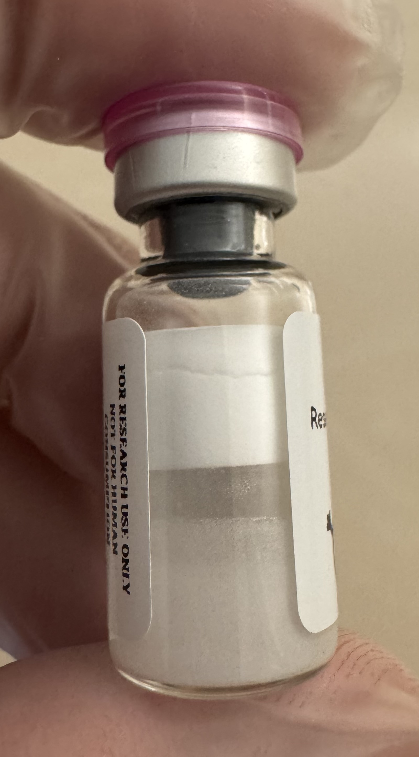 Lyophilized Retatrutide (GIP/GLP-1/glucagon) 30mg powder cake inside the sealed vial