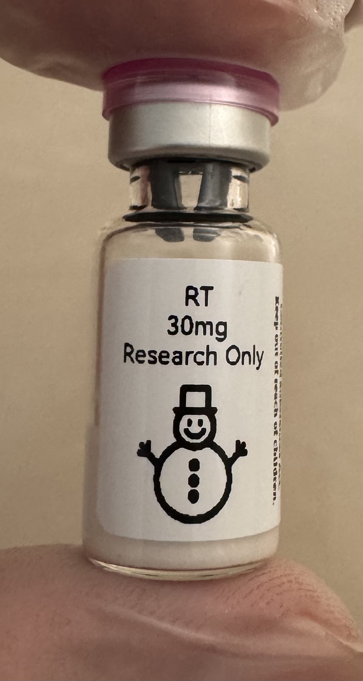 Retatrutide (GIP/GLP-1/glucagon) 30mg freeze-dried research vial with the snowman label
