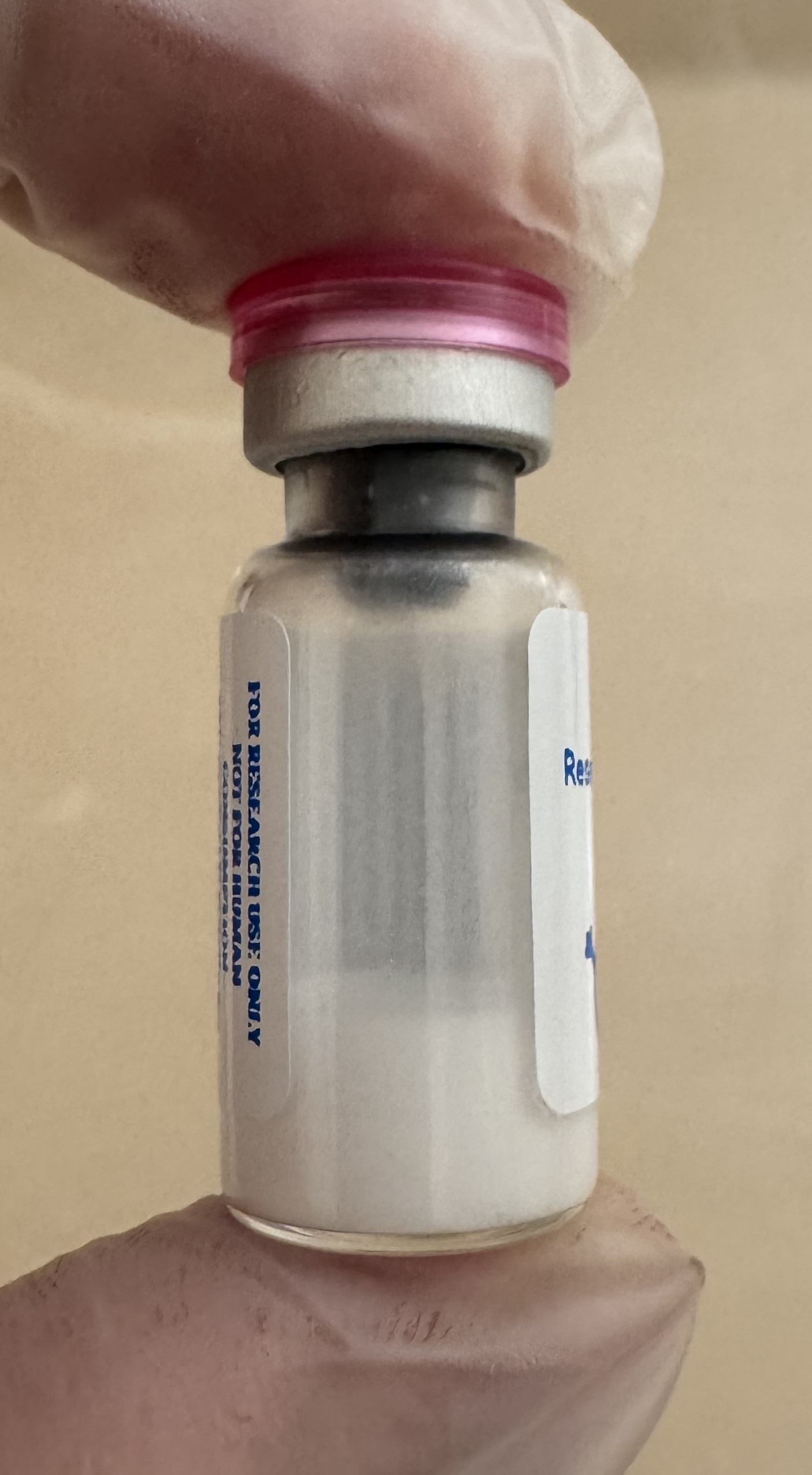 Lyophilized Retatrutide (GIP/GLP-1/glucagon) 5mg powder cake inside the sealed vial