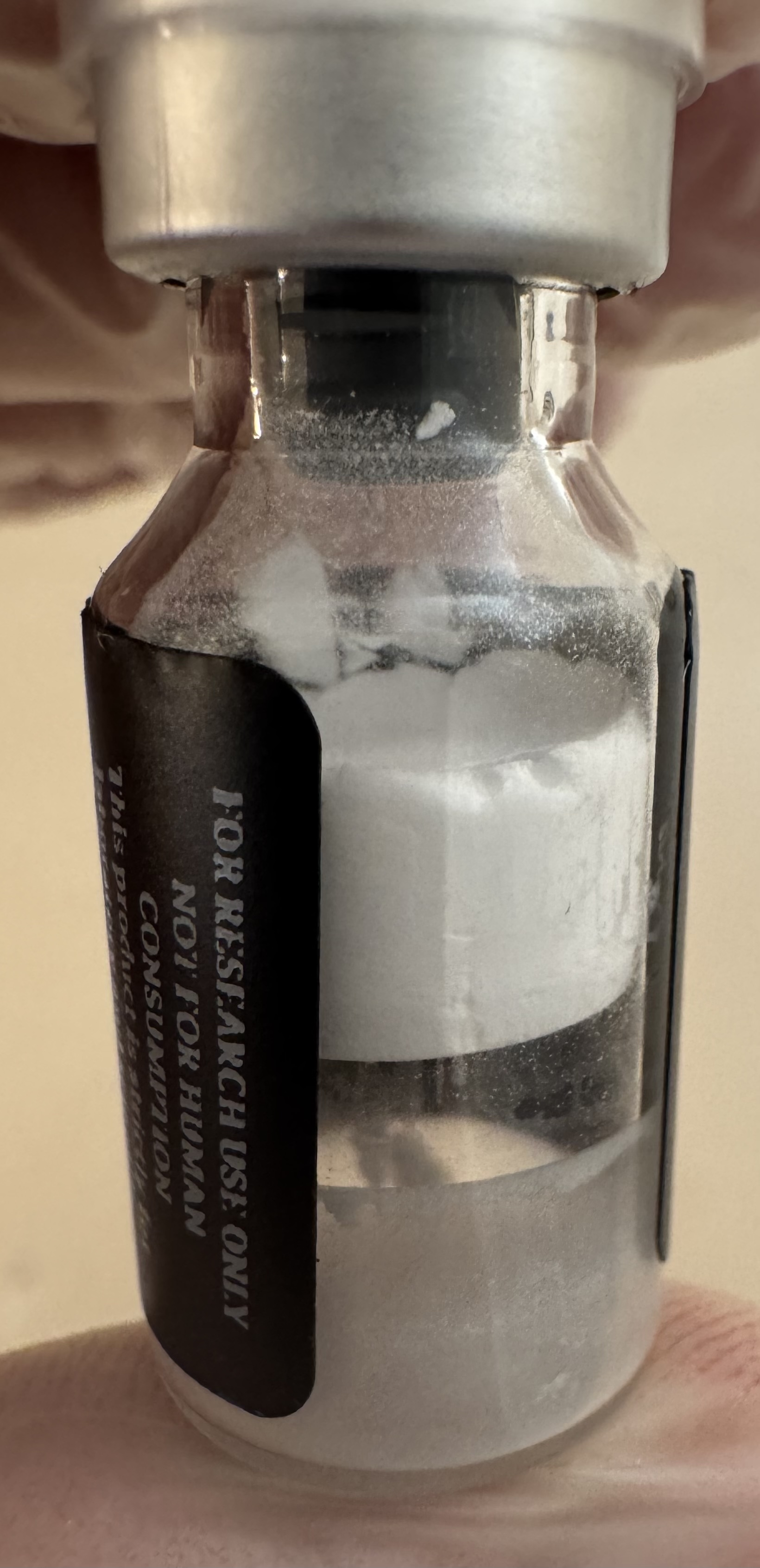 Lyophilized Retatrutide (GIP/GLP-1/glucagon) 60mg powder cake inside the sealed vial