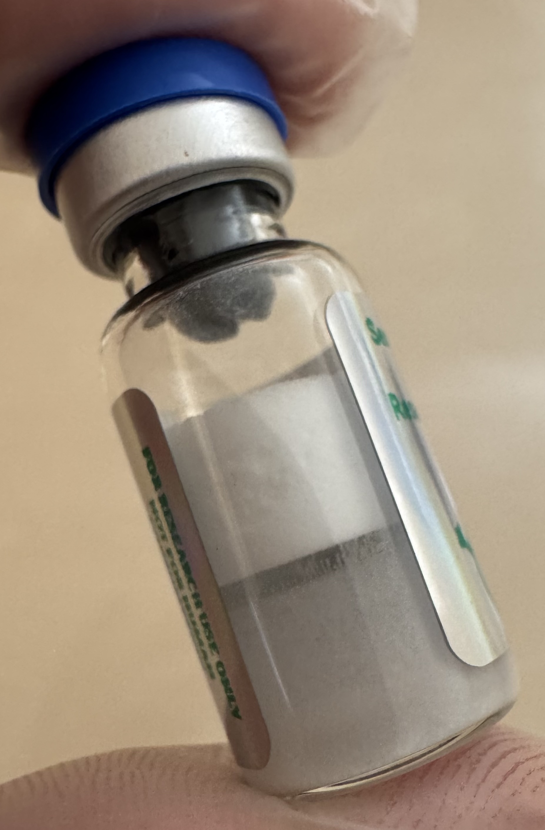 Lyophilized Semaglutide GLP-1 receptor agonist 5mg powder cake inside the sealed vial