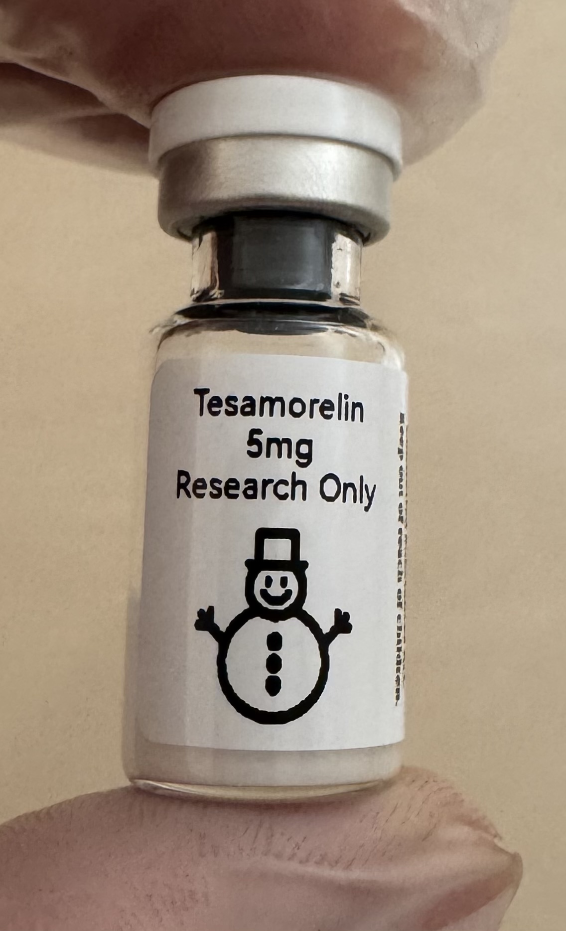 Tesamorelin GHRH analog 5mg freeze-dried research vial with the snowman label