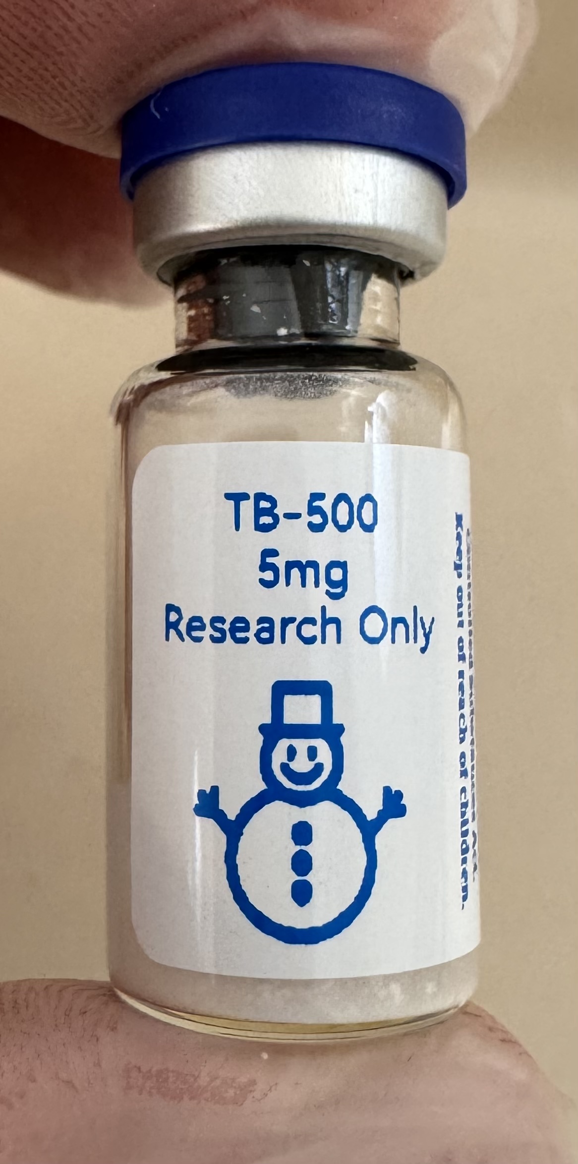 TB-500 thymosin beta-4 fragment 5mg freeze-dried research vial with the snowman label