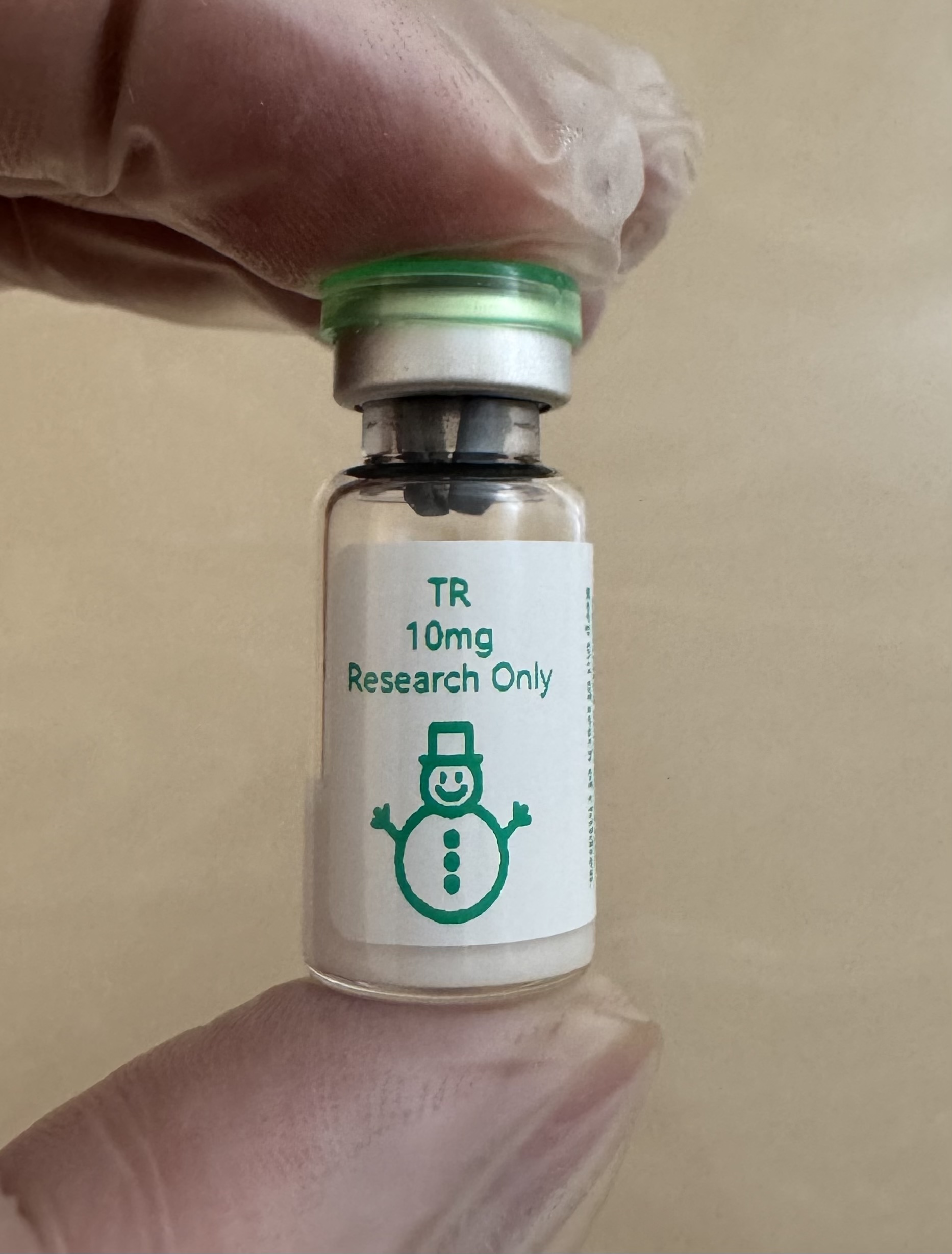 Tirzepatide (GIP/GLP-1) 10mg freeze-dried research vial with the snowman label