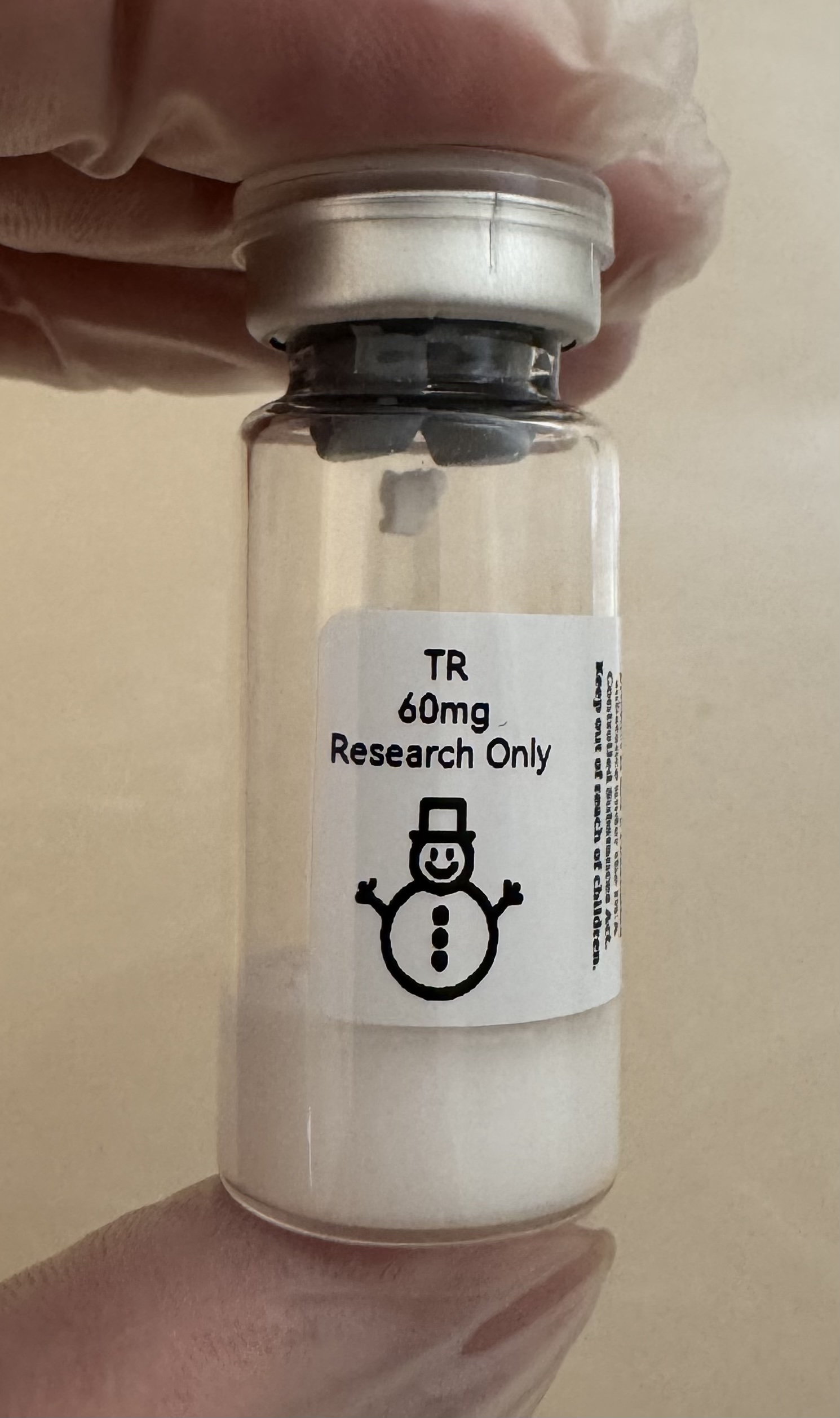 Tirzepatide (GIP/GLP-1) 60mg freeze-dried research vial with the snowman label